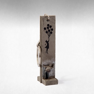 Lot 124 - Banksy (British 1974 -), 'Walled Off Hotel - Key Fob Wall Section (Girl With Balloons)'