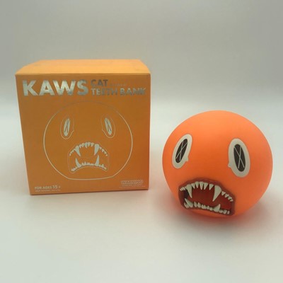 Lot 236 - Kaws (American 1974-), 'Cat Teeth Bank (Orange)', 2007