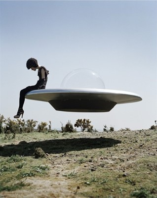 Lot 166 - Tim Walker (British 1970-), 'Kinga Rajzak On Flying Saucer, Eglingham Hall, Northumberland', 2009