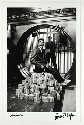 Lot 51 - Howard L Bingham (American 1939-), 'Muhammad Ali Sitting On A Million Dollars, 1963', 2004